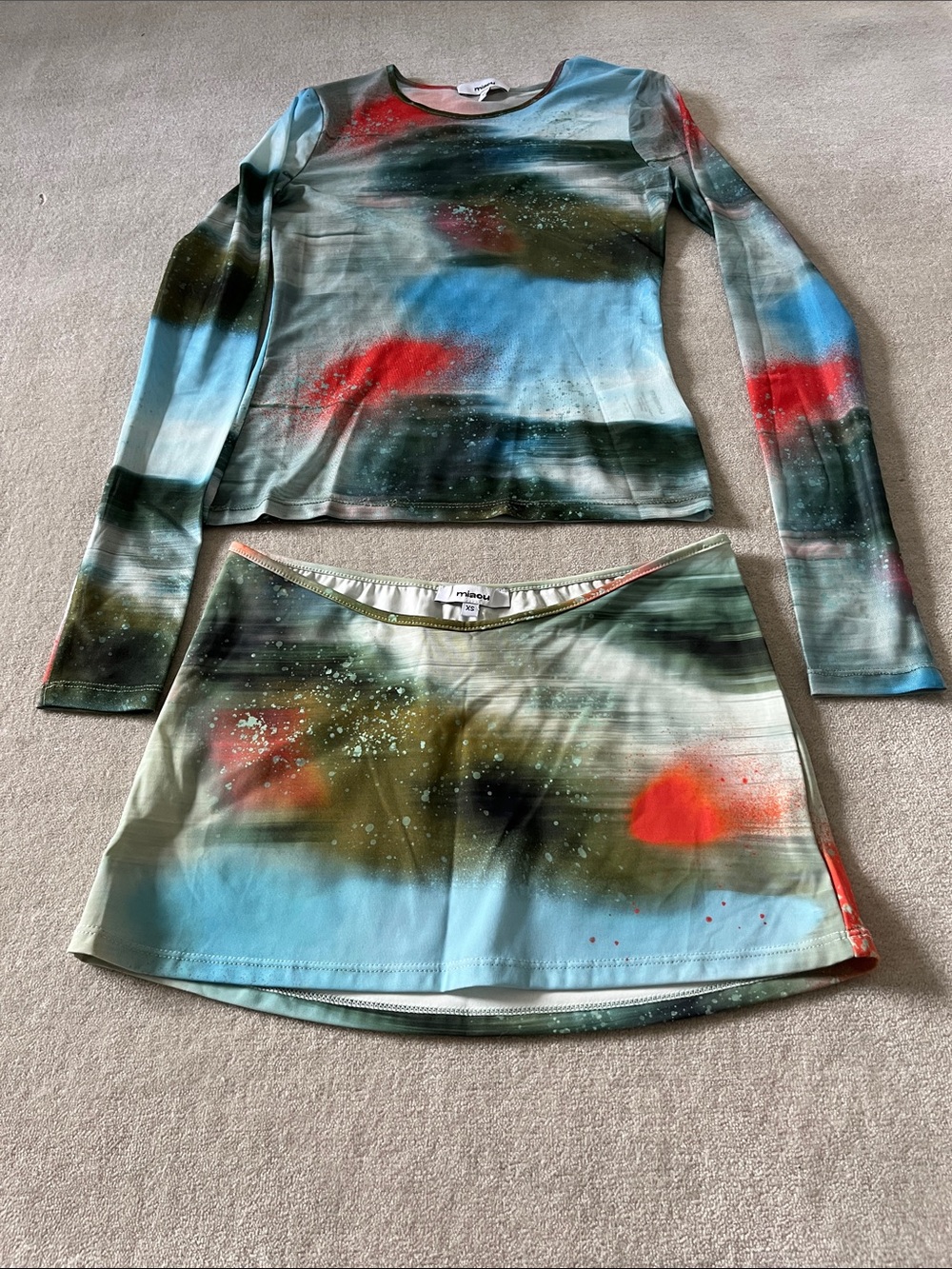 Miaou Abstract Spray Mini Skirt in Blue, Red, Green